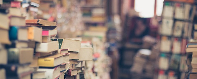 a stack of books in a bookshop