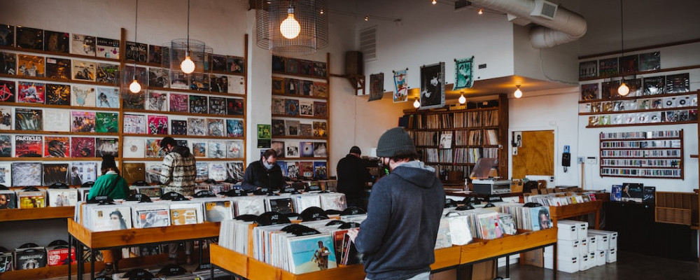 people browsing a record store