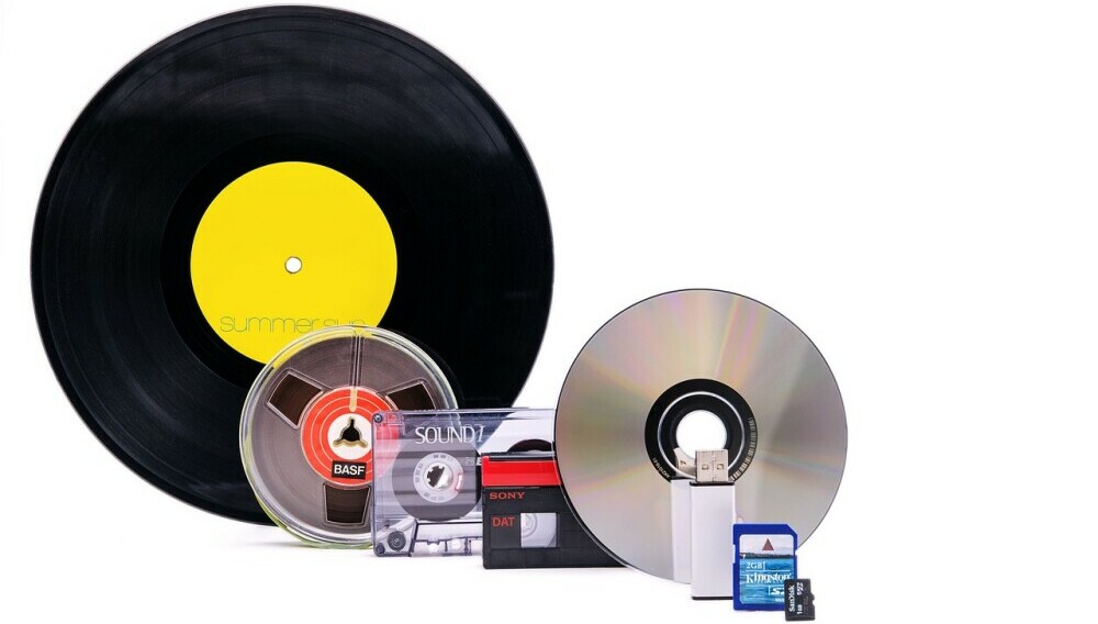 various sound media, including a record and a CD